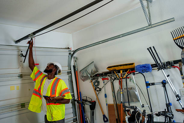 Professional Garage Door Roller Replacement technician working in Derma, MS